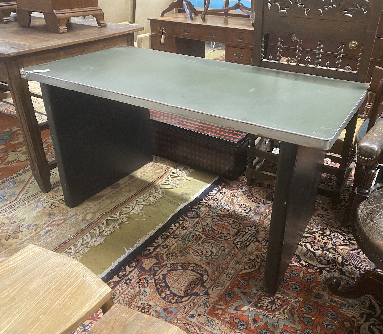 An industrial style metal desk, width 150cm, depth 75cm, height 77cm